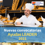Cartel de ayudas LEADER, con un panadero sonriente en su mostrador